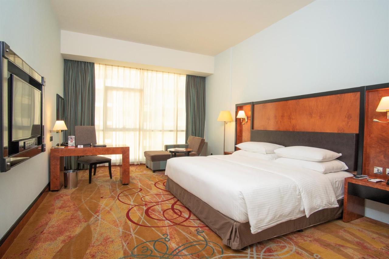 Pool View King Room complimentary shuttle to DXB Airport Terminal 1 & 3,1154646543:JPEG