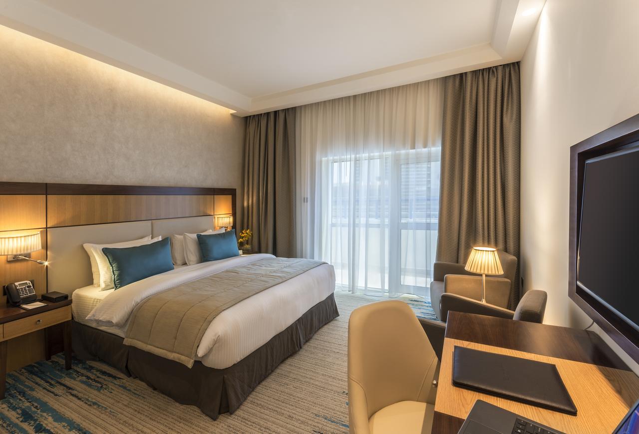 Quarto Deluxe com Cama King-size (Transfer Gratuito para a Praia e Shoppings Selecionados e 20% de Desconto em Comidas e Bebidas e no Spa)